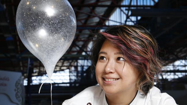 Masterchef's Christy Tania pictured with a sugar balloon desert that contestants had hours to recreate. Picture: David Caird