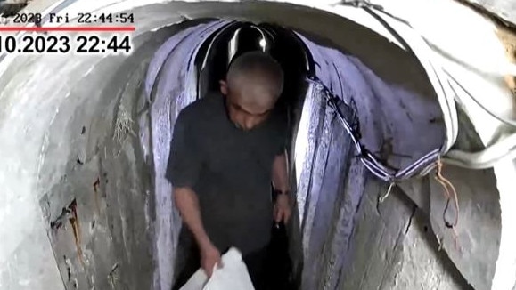 The Israel army has released footage it says shows Hamas leader Yahya Sinwar fleeing underground before the October 7 attack.