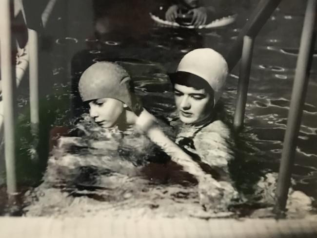 Shirley Owen, then aged 24, treating a Danish boy afflicted with Polio in a hospital hydrotherapy pool at Helsinger in 1953. Picture: Supplied