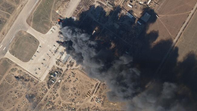 Ukrainian forces take the fight back to the Russians, launching an air strike on helicopters stationed on the occupied air base at Kherson. Picture: Planet Labs via AFP