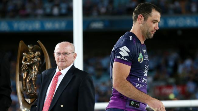 Cameron Smith walks past the trophy after the loss. .2016 NRL Grand Final match between Melbourne Storm and Cronulla Sharks at the ANZ Stadium Homebush, Sydney, Australia on October 2, 2016. Picture: Colleen Petch.