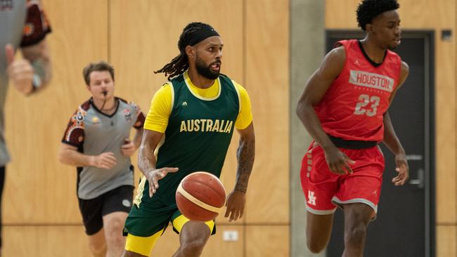 Patty Mills in action against the University of Houston in Cairns. Picture: Emily Barker/Getty Images