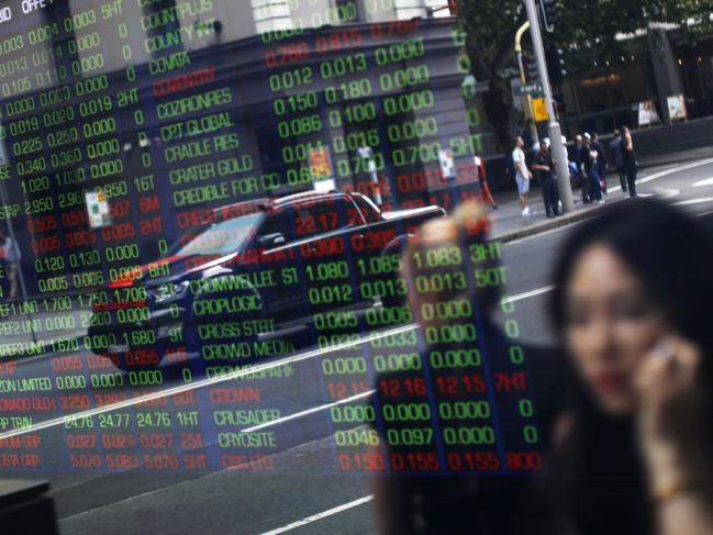 Pedestrians are reflected in a window as they walk past an electronic stock board at the ASX Ltd. exchange centre in Sydney, Australia, on Thursday, Feb. 14, 2019. “We made good progress on our core initiatives across the period, including the program to replace CHESS with distributed ledger technology; upgrade of our secondary data centre to strengthen market resilience; and restructure of our Listings Compliance team to enhance the quality of market oversight,” ASX Chief Executive Officer Dominic Stevens said. Photographer: David Moir/Bloombergrket resilience; and restructure of our Listings Compliance team to enhance the quality of market oversight,” ASX Chief Executive Officer Dominic Stevens said. Photographer: David Moir/Bloomberg