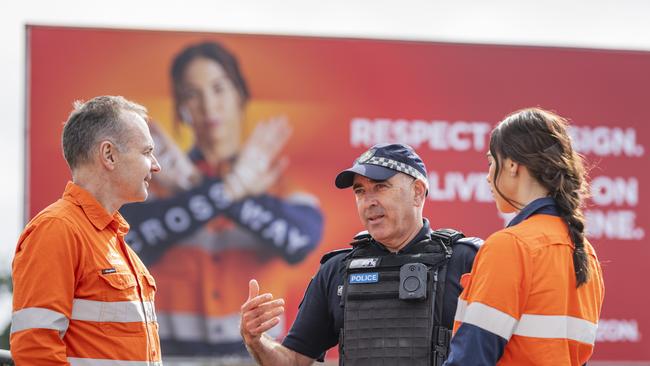 At Aurizon level crossing safety press conference are (from left) Aurizon CEO and managing director Andrew Harding, Queensland Police Service Railway Squad OIC Senior Sergeant Simon Arnold and Aurizon train driver Hayleigh Hess, Thursday, June 6, 2024. Picture: Kevin Farmer