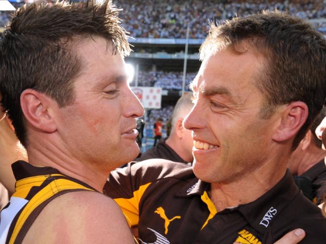 27/09/2008 SPORT: 2008 Grand Final. Geelong v Hawthorn. MCG. Shane Crawford is congratulated by coach Alastair Clarkson.