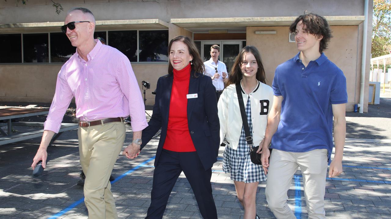 Cressida O'Hanlon arrives to vote with the support of family, including husband James, Phoebe, 11, and Cy, 16. Picture: Dean Martin