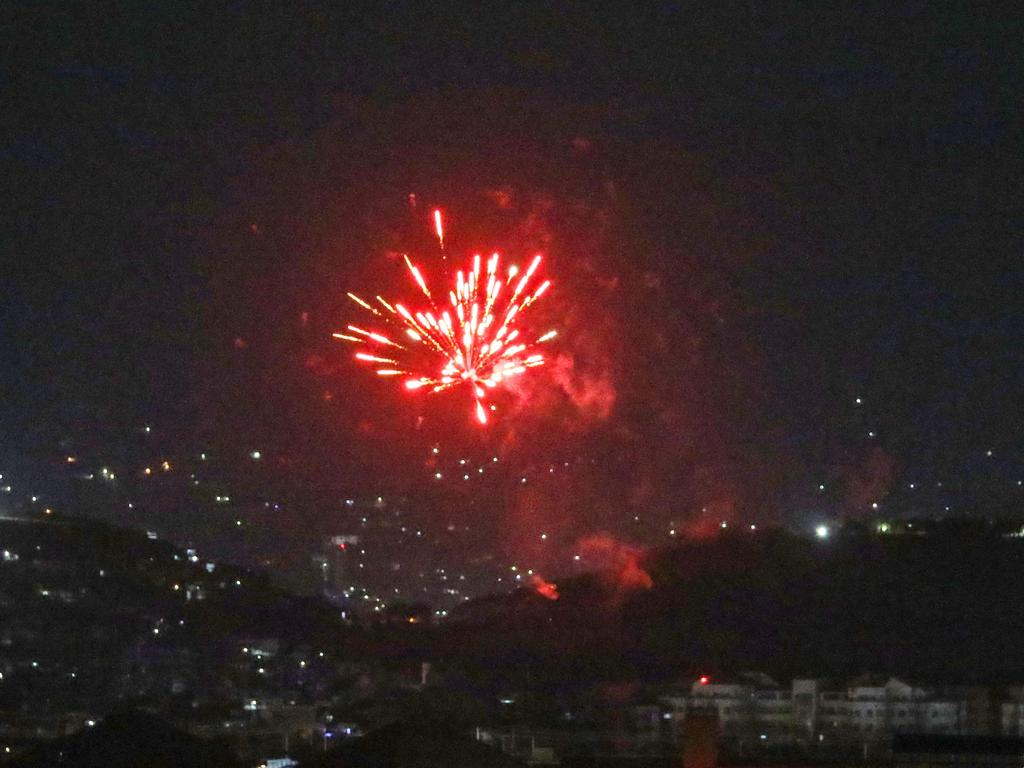 Celebratory fireworks light up part of the night sky after the last US aircraft took off from the airport in Kabul. Picture: AFP