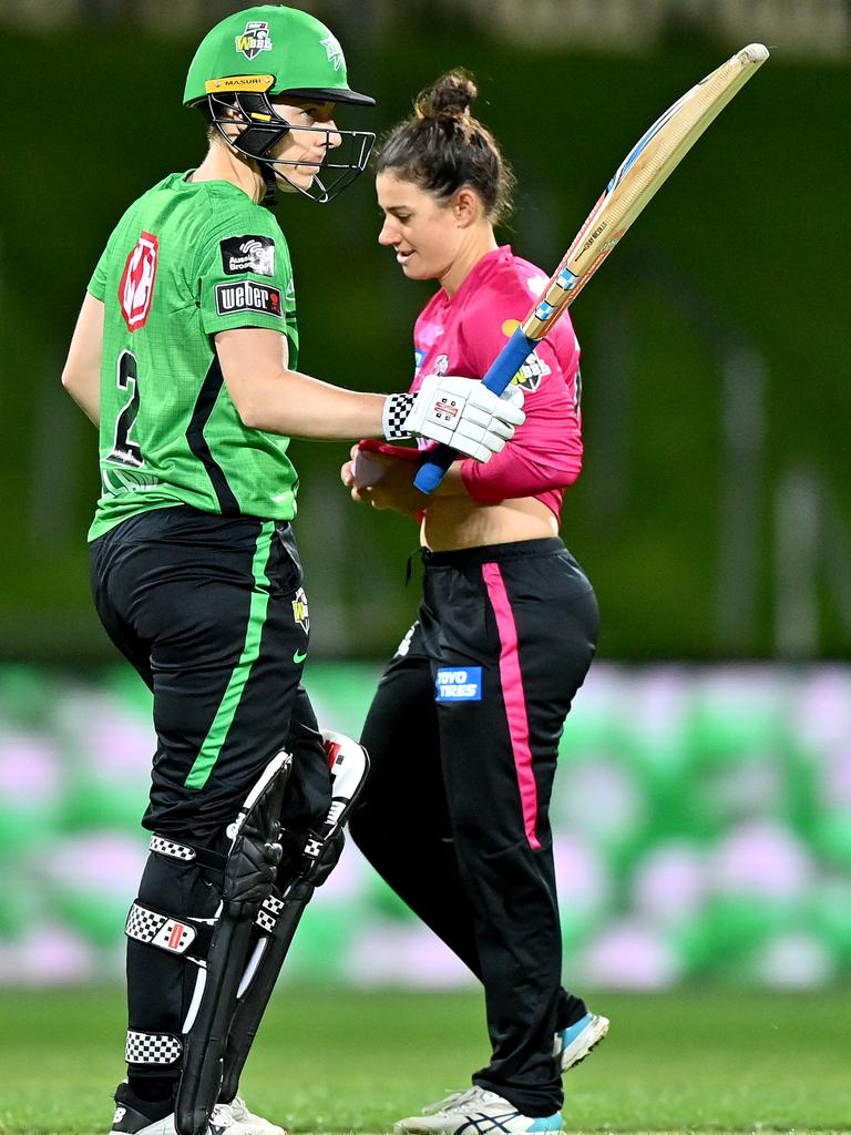 Villani raises her bat after reaching 50. Picture: Getty Images