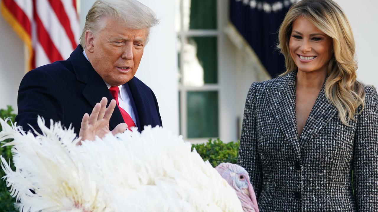 US President Donald Trump pardons Thanksgiving turkey "Corn" as First Lady Melania Trump watches. Picture: Mandel Ngan/AFP
