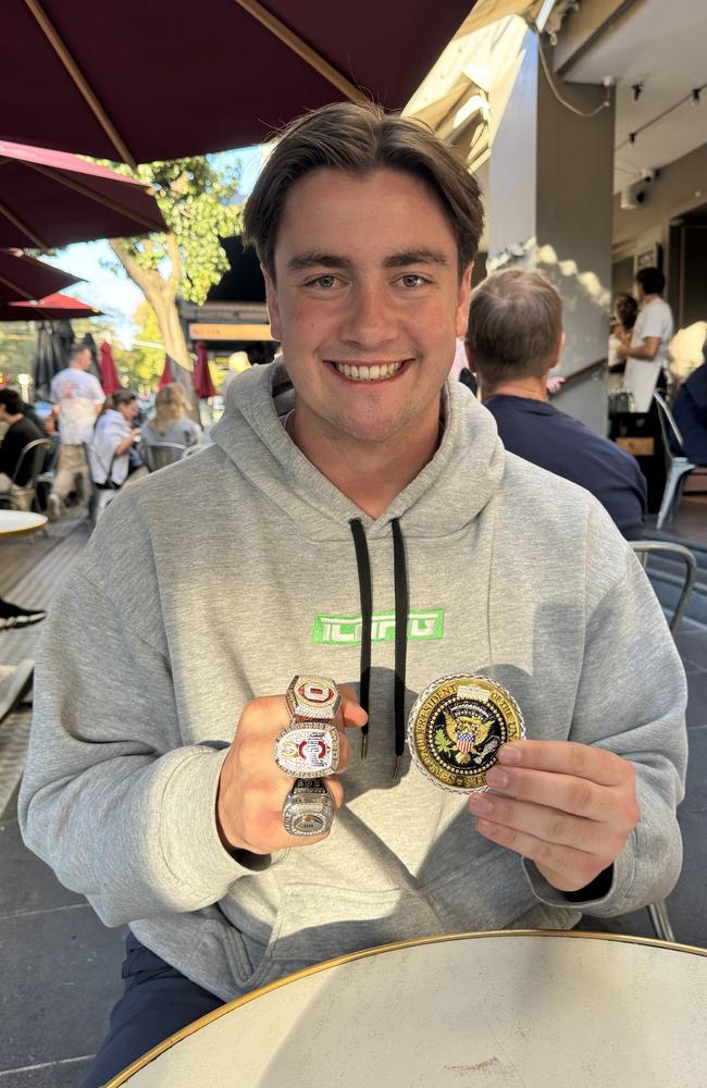 Joe McGuire with his winners’ rings and medallion from a meeting with US president Donald Trump at the White House.