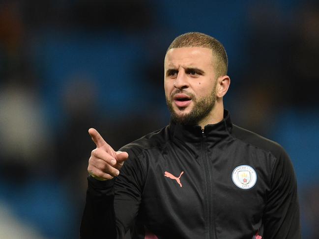 (FILES) In this file photo taken on November 26, 2019 Manchester City's English defender Kyle Walker gestures during the UEFA Champions League football Group C match between Manchester City and Shakhtar Donetsk at the Etihad Stadium in Manchester, north west England. - Kyle Walker is facing disciplinary action from Manchester City despite apologising after breaching coronavirus lockdown conditions even though he advised people to stay at home. (Photo by Oli SCARFF / AFP)