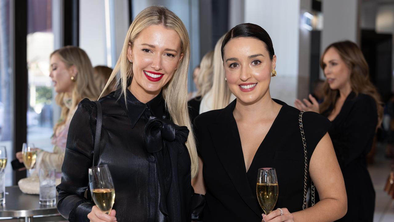 Carla Martin and Sarah Andrews at Fuelled by Fashion Porsche luncheon at the Langham Hotel Gold Coast. Photo: Celeste Humphrey