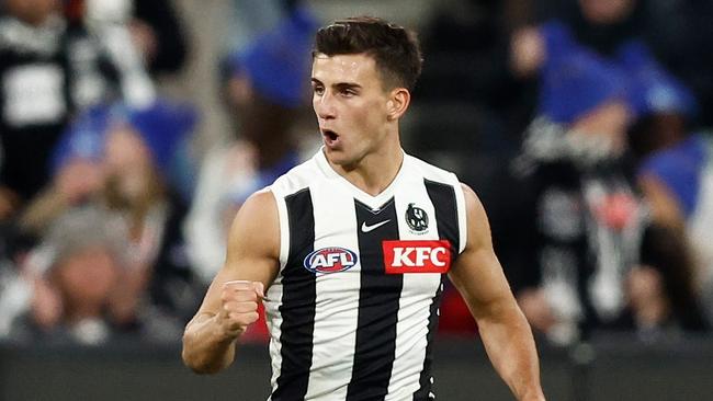 MELBOURNE, AUSTRALIA - JUNE 12: Nick Daicos of the Magpies celebrates a goal during the 2023 AFL Round 13 match between the Melbourne Demons and the Collingwood Magpies at the Melbourne Cricket Ground on June 12, 2023 in Melbourne, Australia. (Photo by Michael Willson/AFL Photos via Getty Images)