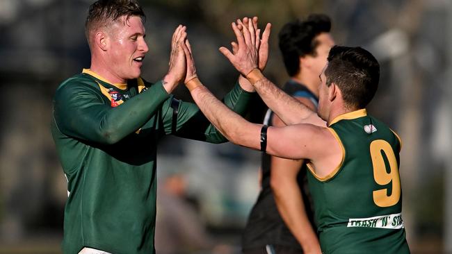 Matthew Keys and Nick Snowdon celebrate a goal for Old Eltham Collegians. Picture: Andy Brownbill