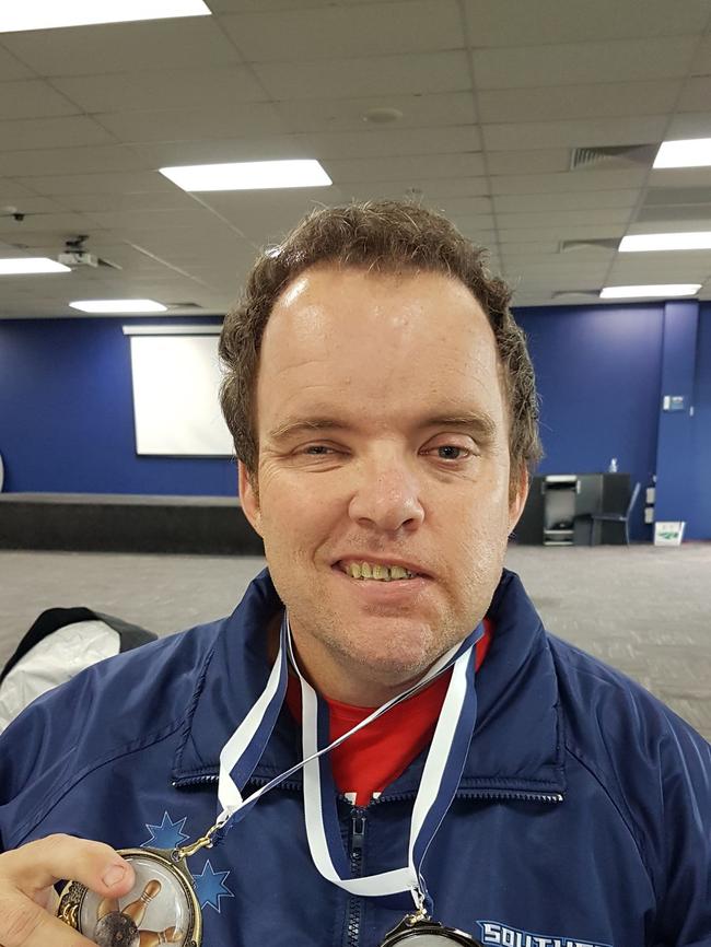 Andrew with his medals from the 2023 bowling national competition, held at his local club. Picture: Supplied