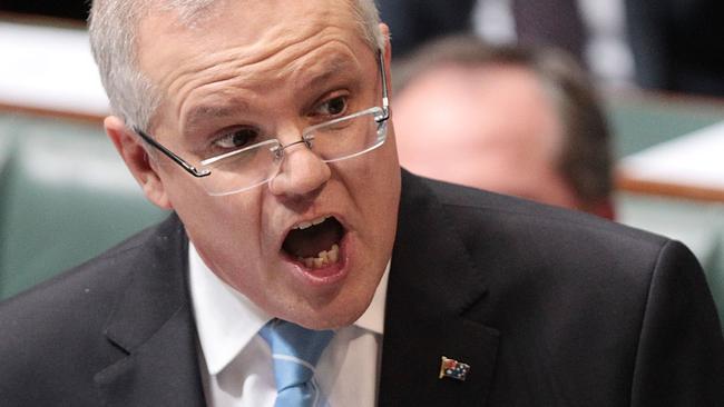 CANBERRA, AUSTRALIA - MAY 04: Treasurer Scott Morrison during House of Representatives question time at Parliament House on May 4, 2016 in Canberra, Australia. The Turnbull Goverment's first budget has delivered tax cuts for small and medium businesses, income tax cuts people earning over $80,000 a year,new measures to help young Australians into jobs and cutbacks to superannuation concessions for the wealthy. (Photo by Stefan Postles/Getty Images)