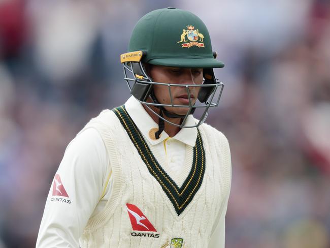 Australia's Usman Khawaja makes his way from the pitch after loosing his wicket caught by Jonny Bairstow for 8 on the first day of the 3rd Ashes Test cricket match between England and Australia at Headingley cricket ground in Leeds, England, Thursday, Aug. 22, 2019. (AP Photo/Jon Super)