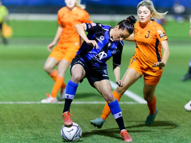 Maria Jose Rojas Pino – 2020 NPL Player of the Season – controls the ball against her Adelaide City opponent. Photo: Supplied, Adam Butler