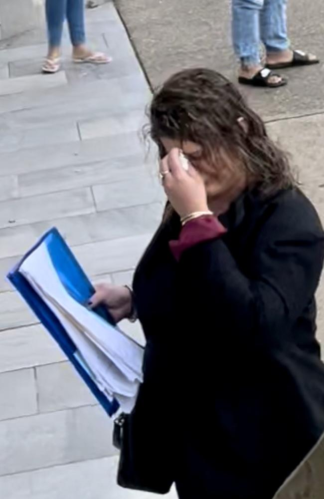 Waterford West mother Shaira May Lourdes Lacquiere, 25, takes a break at Beenleigh Magistrates Court during her sentencing for an assault on a neighbour. Picture: Marcel Baum.