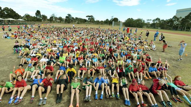 Williamstown High School students celebrating school's centenary with a wacky world record attempt. Most number of people doing sit ups for one minute. Picture: kris Reichl