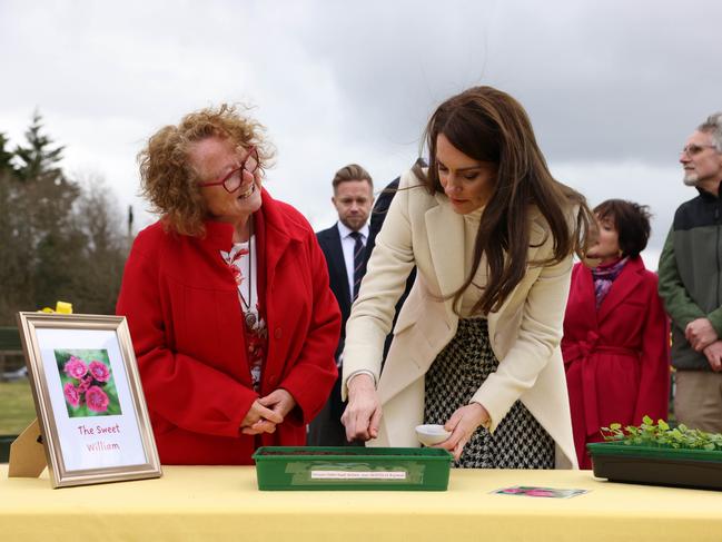 The Princess of Wales plants seeds at Brynawel Rehabilitation Centre. Picture: Getty Images