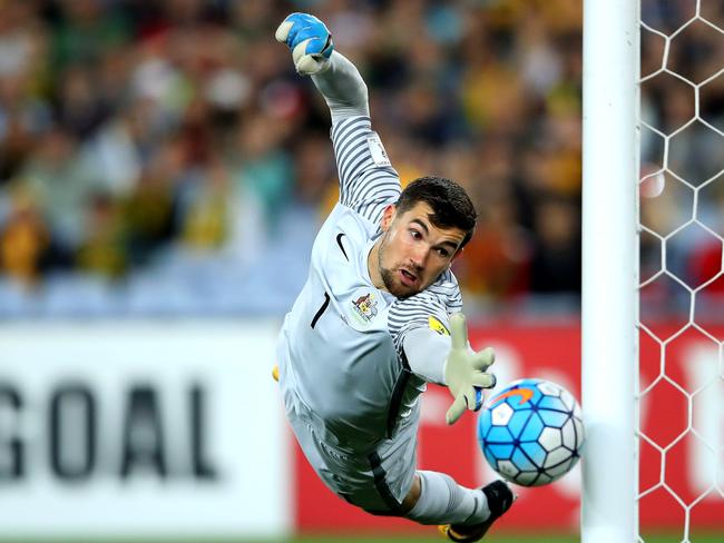 SYDNEY, AUSTRALIA - OCTOBER 10: Mathew Ryan of Australia saves a goal during the 2018 FIFA World Cup Asian Playoff match between the Australian Socceroos and Syria at ANZ Stadium on October 10, 2017 in Sydney, Australia.  (Photo by Cameron Spencer/Getty Images) ***BESTPIX***