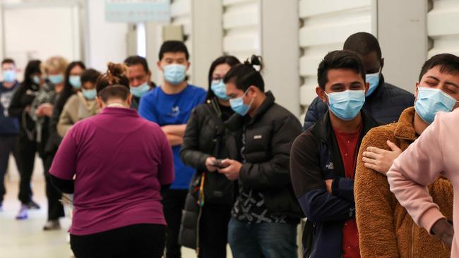 Aged care and disability care workers line up for their vaccine at the Melbourne Showgrounds vaccination hub. Picture: NCA NewsWire / Ian Currie