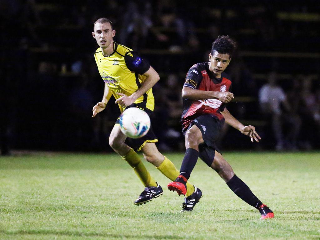 Lions' Seamus Fowler kicks the ball down the pitch in the FNQ Premier League men's match between the Edge Hill Tigers and the Leichhardt Lions, held at Tiger Park, Maunda. Picture: Brendan Radke