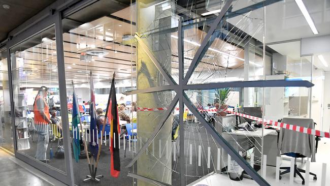 The smashed class room window from a protest at the University of Queensland on May 9. Picture: John Gass