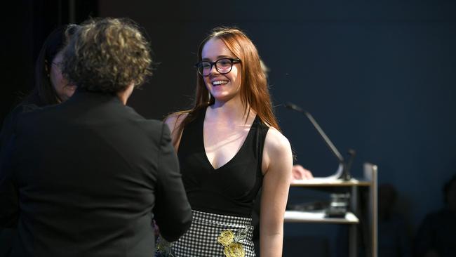 Olivia Wormwell reciving an award at the QCE Awards presentation. Picture: AAP/John Gass
