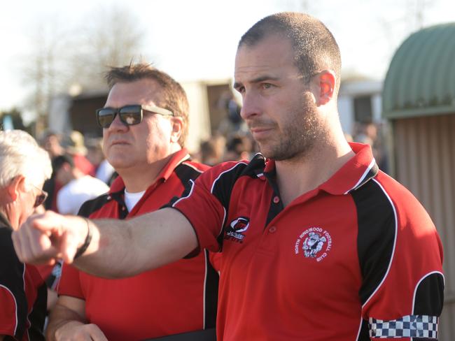 Brett Moyle calls the shots from the sidelines in the 2014 grand final.