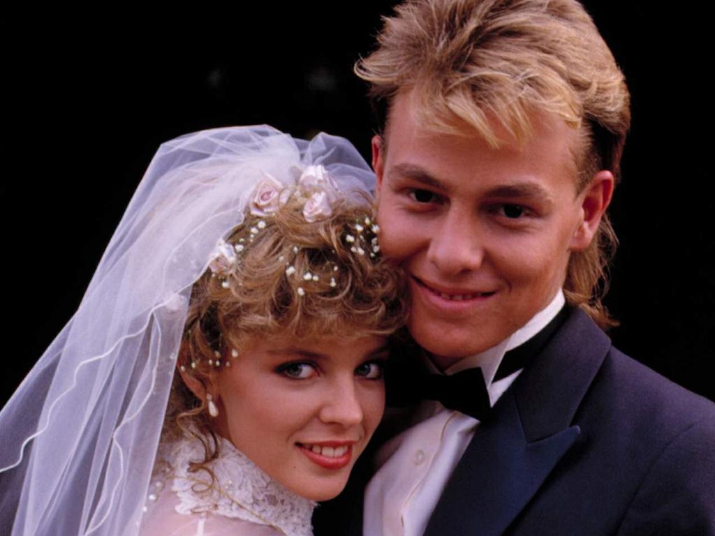 The pair married in Neighbours and dated off screen in the Eighties.  Picture:  AFP