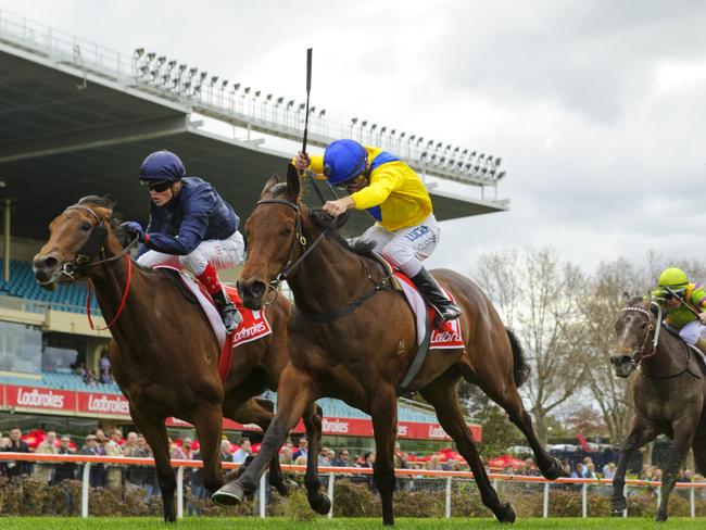 Luke Currie and Roomooz (right) manage to hold off a desperate Tulip in the third. Picture: Getty Images