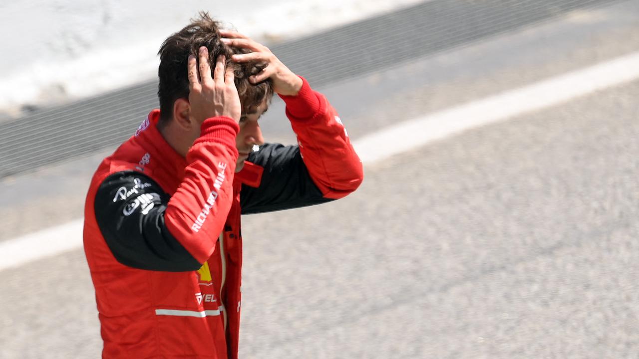 Absolute disaster for Charles Leclerc and Ferrari. (Photo by LLUIS GENE / AFP)