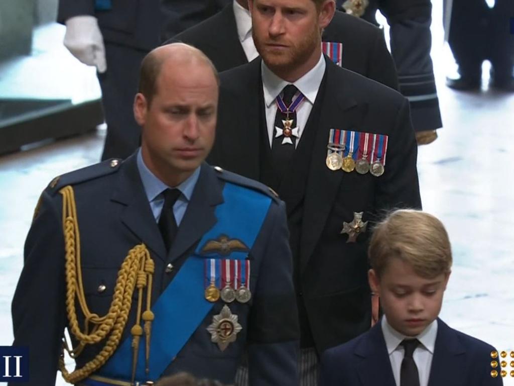 Prince William and Prince George following the Queen's coffin into Westminster Abbey