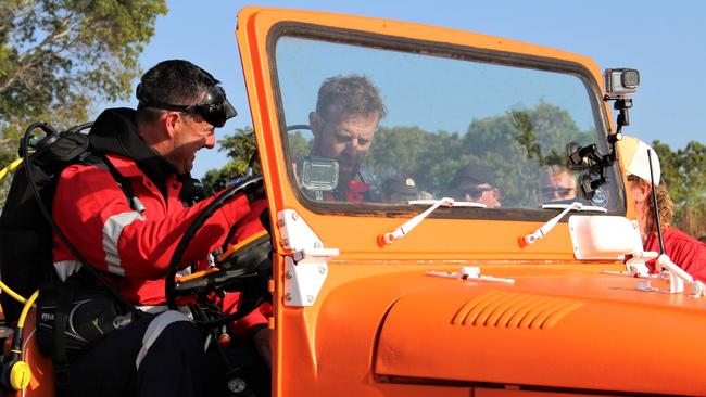 Mechanic Taylor Smith and engineer Luke Purdy behind the wheel of the Mud Crab. Picture: Jason Walls