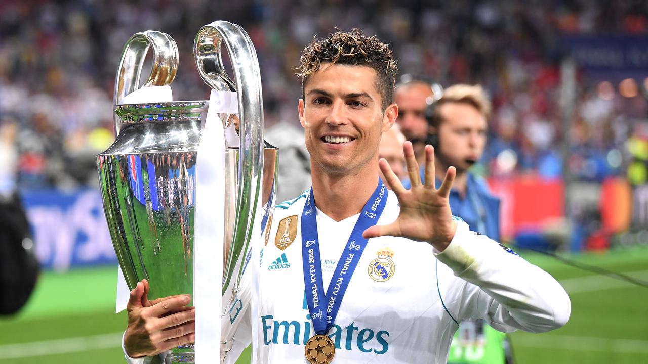 Cristiano Ronaldo of Real Madrid lifts The UEFA Champions League trophy