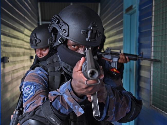 The Special Services Division of the Papua New Guinea police train in urban protection prior to the APEC meeting. Picture: Brian Cassey