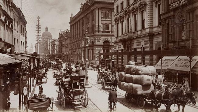  Heavy vehicle traffic in George Street, Sydney in 1900 photograph by photographer Willem van der Velden, part of Sydney Expo...