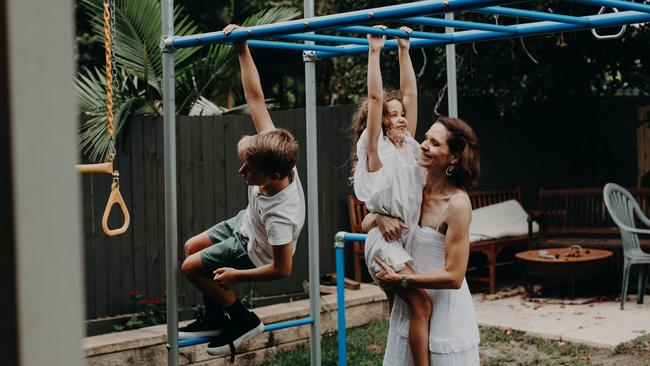 Who needs a gym when you have kids to lift? Picture: Roseann Hall