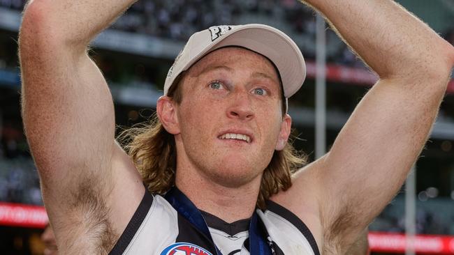 MELBOURNE, AUSTRALIA - SEPTEMBER 30: Nathan Murphy of the Magpies celebrates after the 2023 AFL Grand Final match between the Collingwood Magpies and the Brisbane Lions at the Melbourne Cricket Ground on September 30, 2023 in Melbourne, Australia. (Photo by Russell Freeman/AFL Photos via Getty Images)