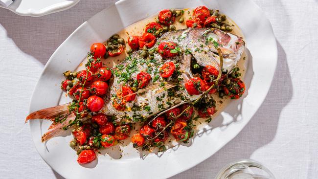 Elizabeth Hewson’s whole snapper in tomato is delicate and easy to get right. Photo: Nikki To / TWAM