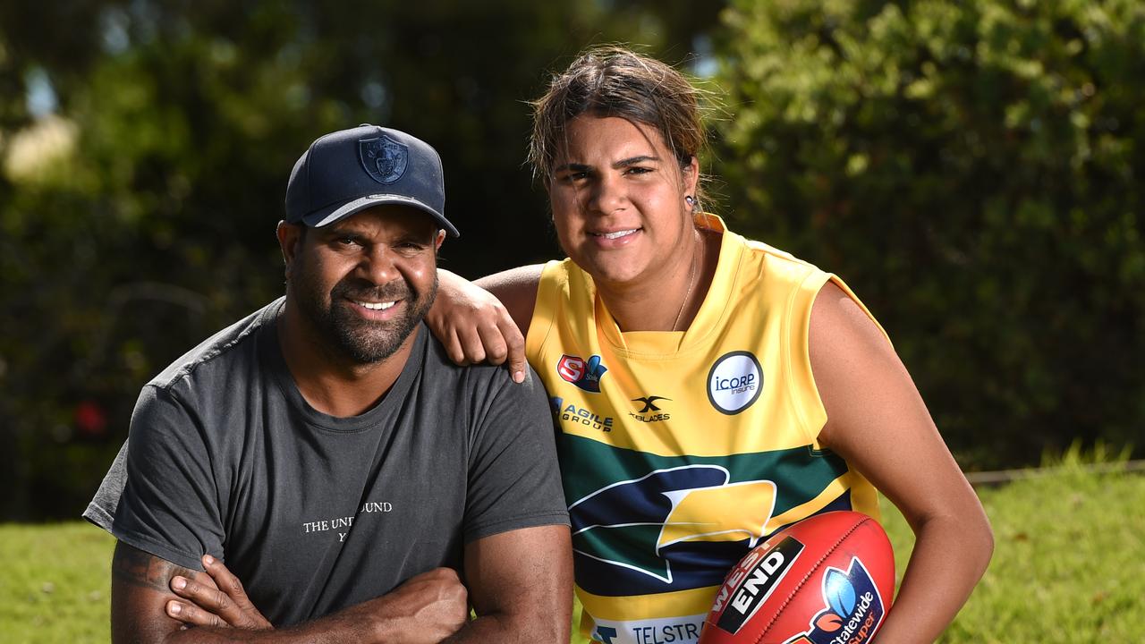 13/12/19 - Lakeesha Pickett, who is the daughter of dual AFL premiership star Byron Pickett, has just been named in the SA under-18 women's footy team. She is also part of Woodville-West Torrens' under-17 team. Byron and Lakeesha at Woodville Oval. Picture: Naomi Jellicoe