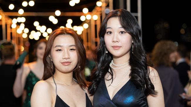 Crystal Liang and Suanne Yeoh at the year 12 St Hilda formal. Photo: Celeste Humphrey