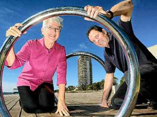 Toni Cameron, daughter of Jack Evans, and Mayor Kevin Skinner explore the boat harbour.