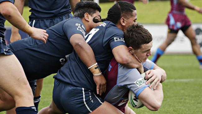 Adam Runchel from The Hills Sports High school scoring a try against Chifley College.