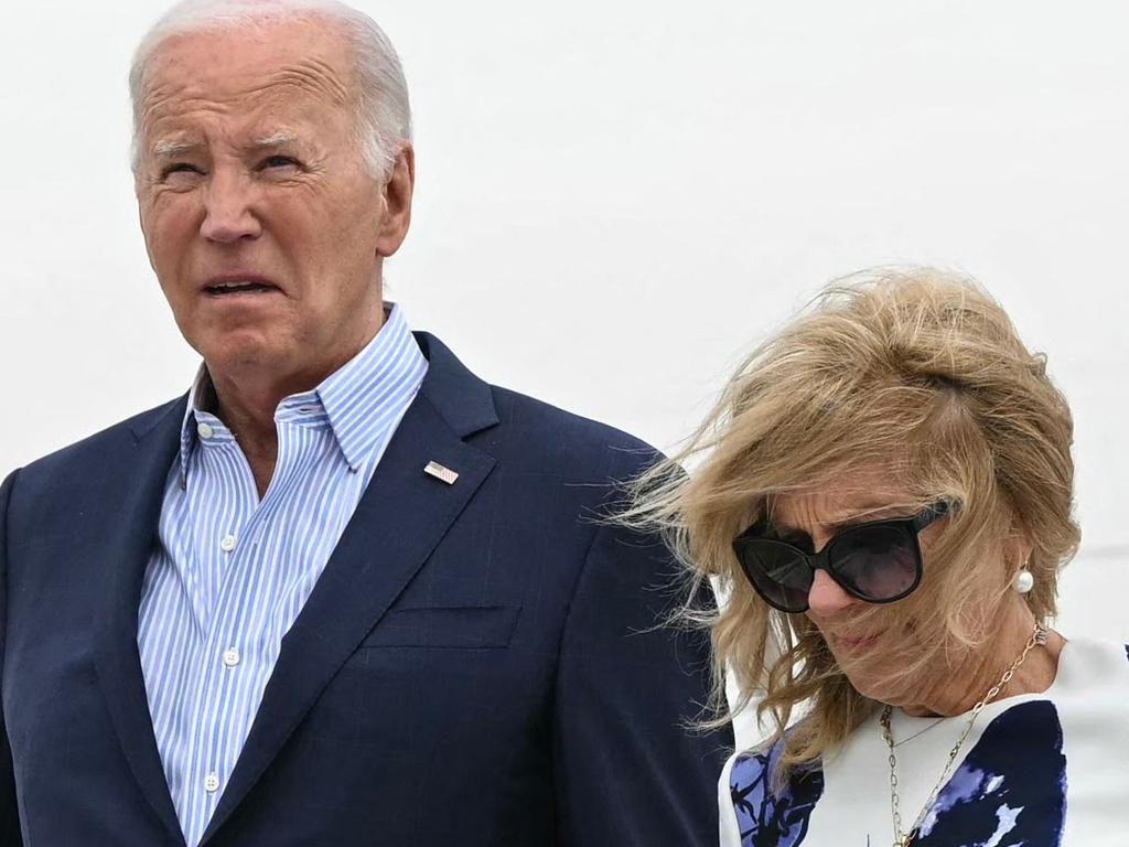 TOPSHOT - US President Joe Biden and First Lady Jill Biden step off Air Force One upon arrival at Francis S. Gabreski Airport in Westhampton Beach, New York on June 29, 2024. Biden is heading to East Hampton, New York, to attend campaign fundraisers. (Photo by Mandel NGAN / AFP)
