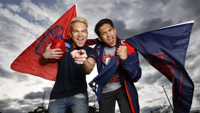 Melbourne fans Ryan Sinclair and Amal Madhusoodanan will be among the fans chasing AFL finals tickets. Picture: Alex Coppel