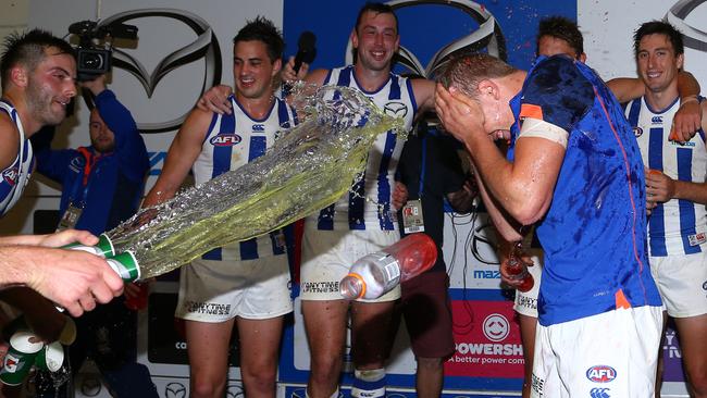 A hamstring injury didn’t save Jed Anderson from a post-match Gatorade shower. Picture: George Salpigtidis