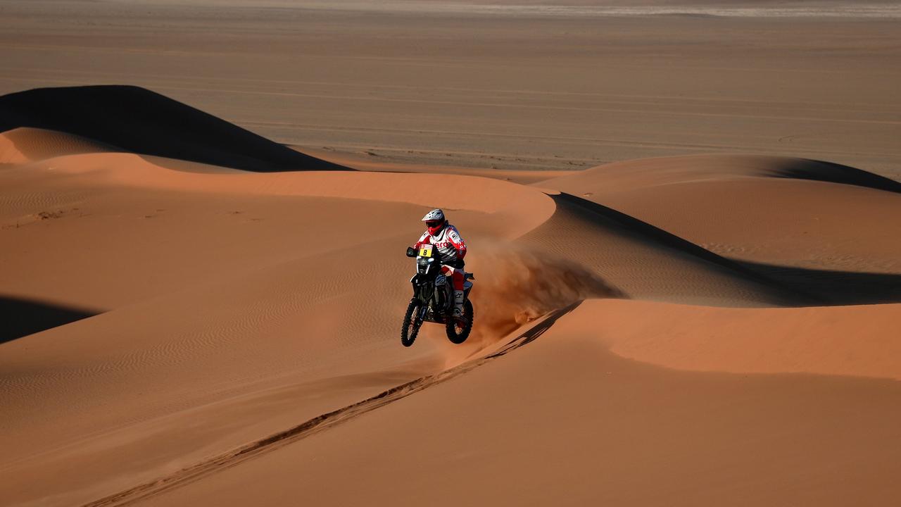 Paulo Goncalves competes in the seventh stage prior to his fatal accident. (Photo by FRANCK FIFE / AFP)